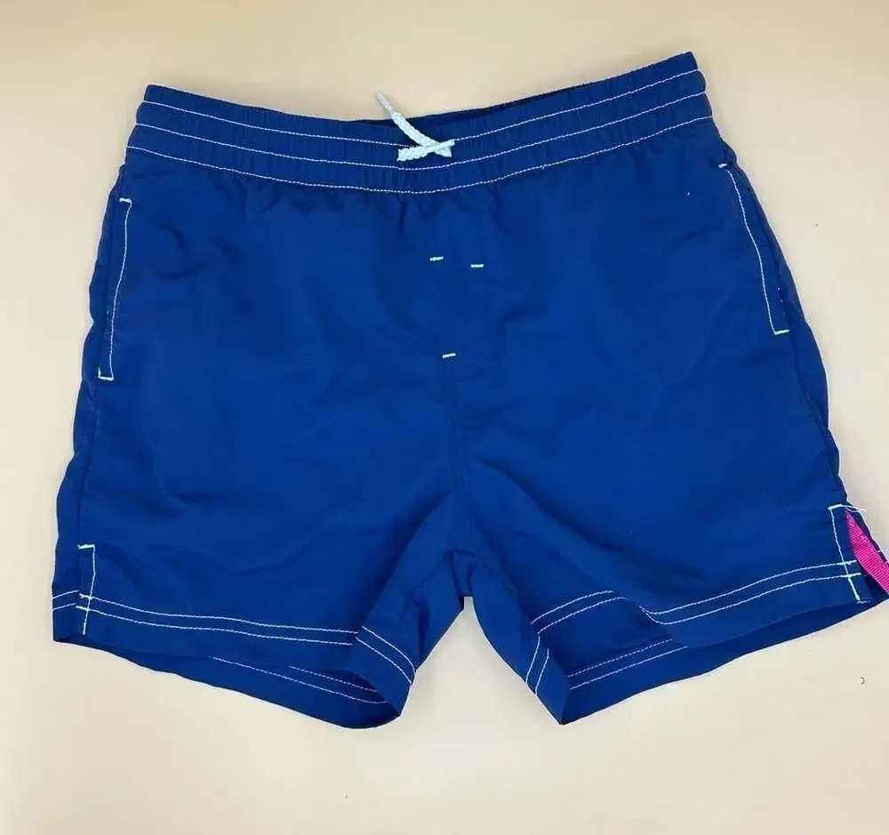 The Beaufort Bonnet Company Blue Boys Swim Trunks with Pelican Embroidery